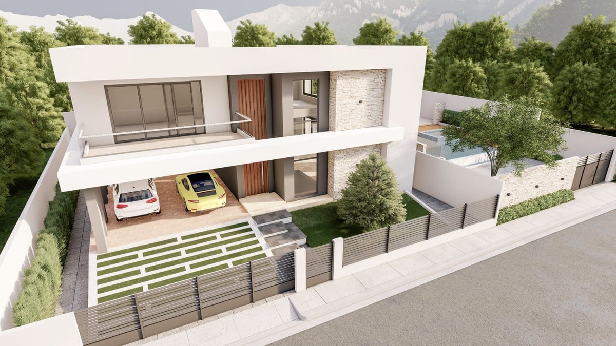 Modern white two-story residential home with glass features, driveway, and manicured landscaping